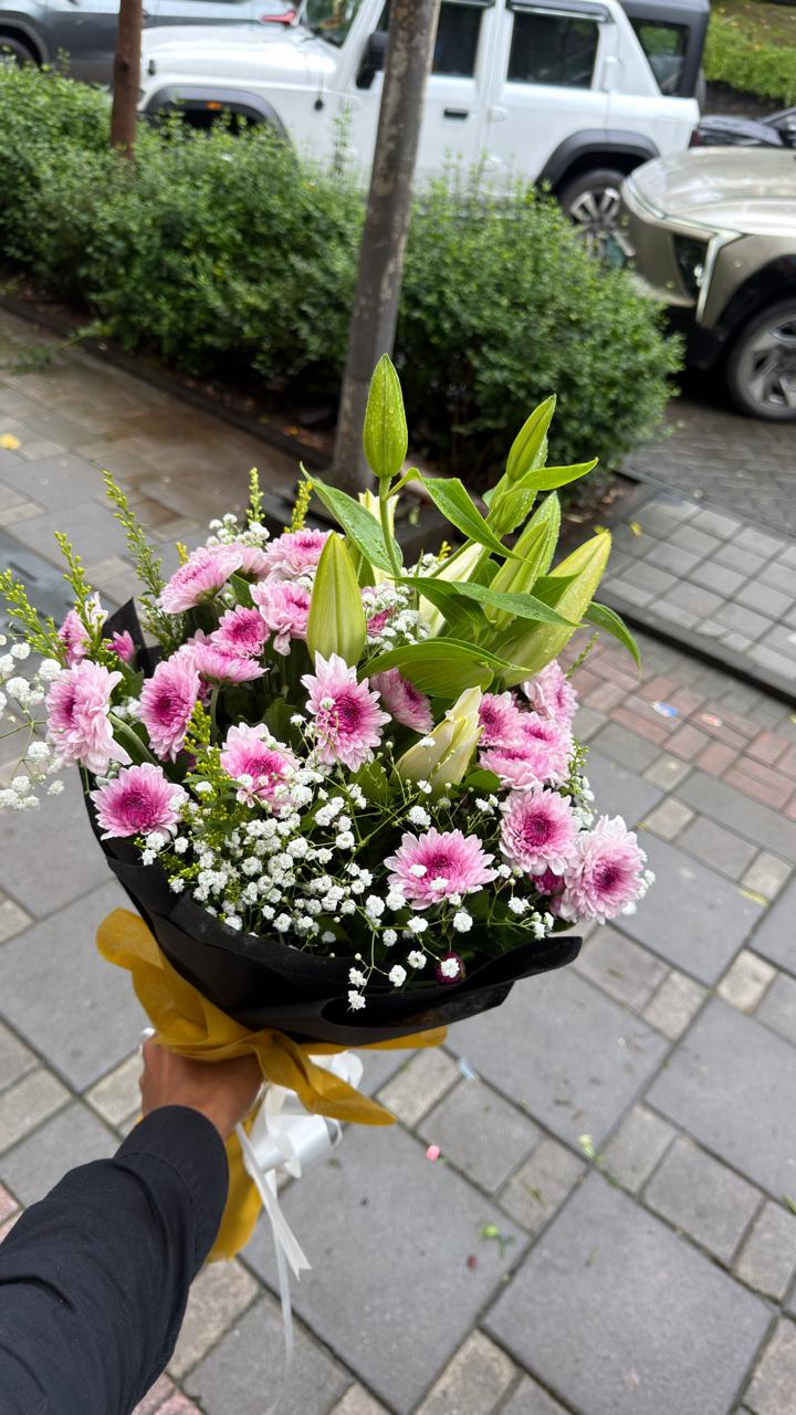 Hand-tied bouquet by Krishna Florist