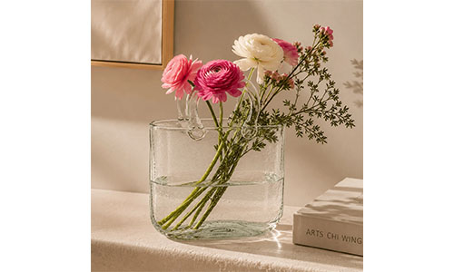 Glass vase floral arrangement for office